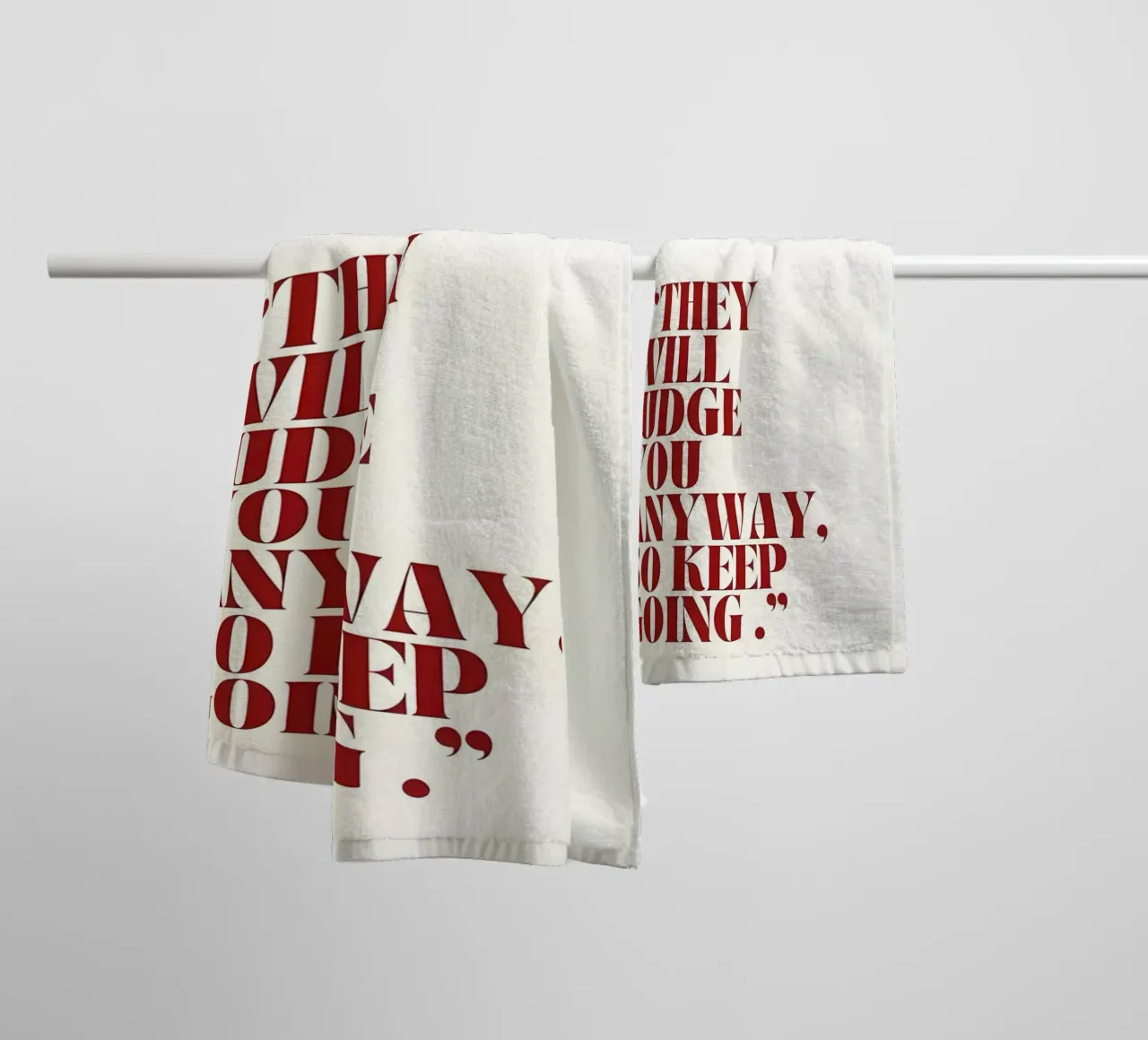 "THEY WILL JUDGE YOU ANYWAY, SO KEEP GOING." badhanddoek van Type & Tape