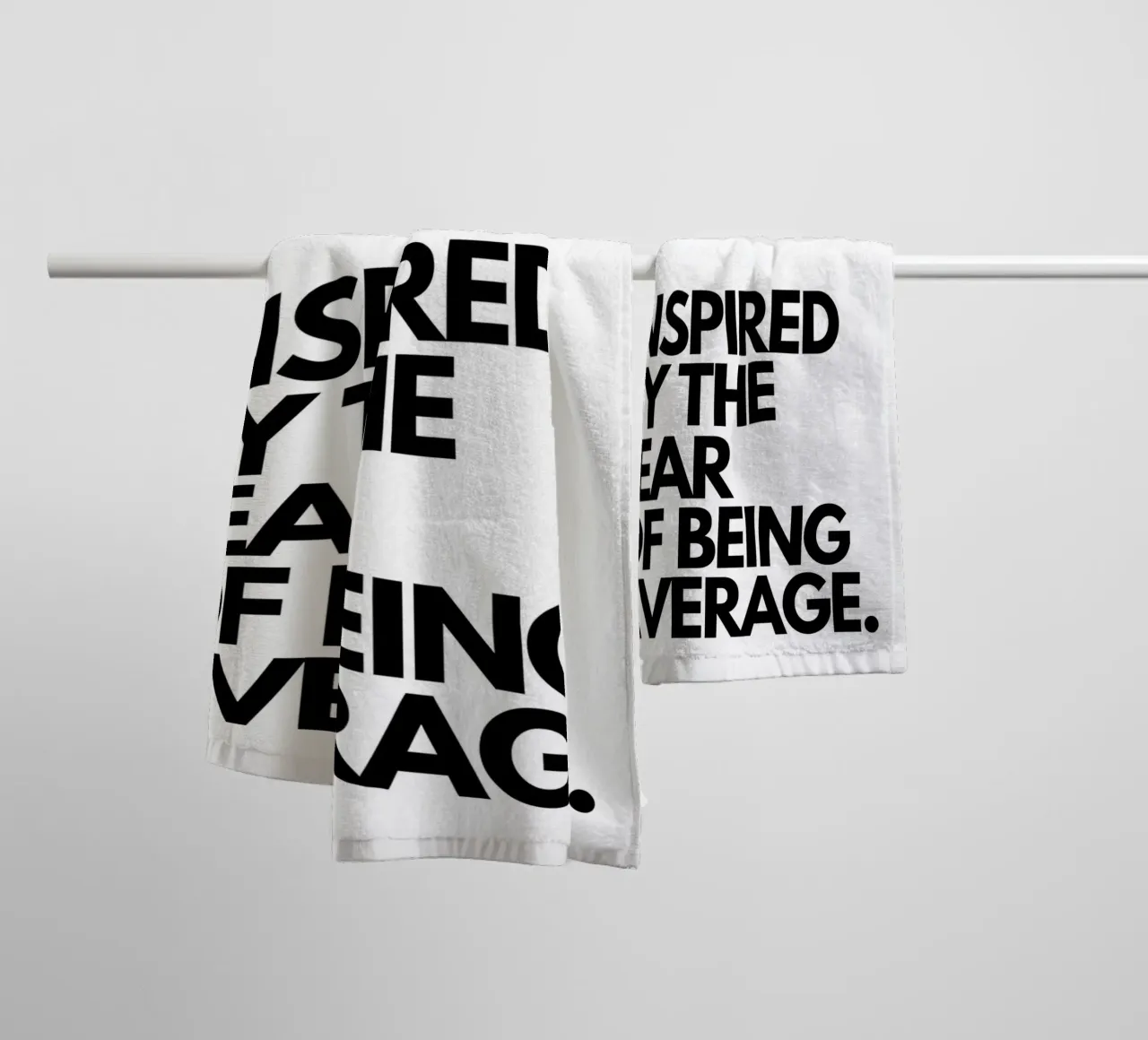 INSPIRED BY THE FEAR OF BEING AVERAGE towel by Type & Tape