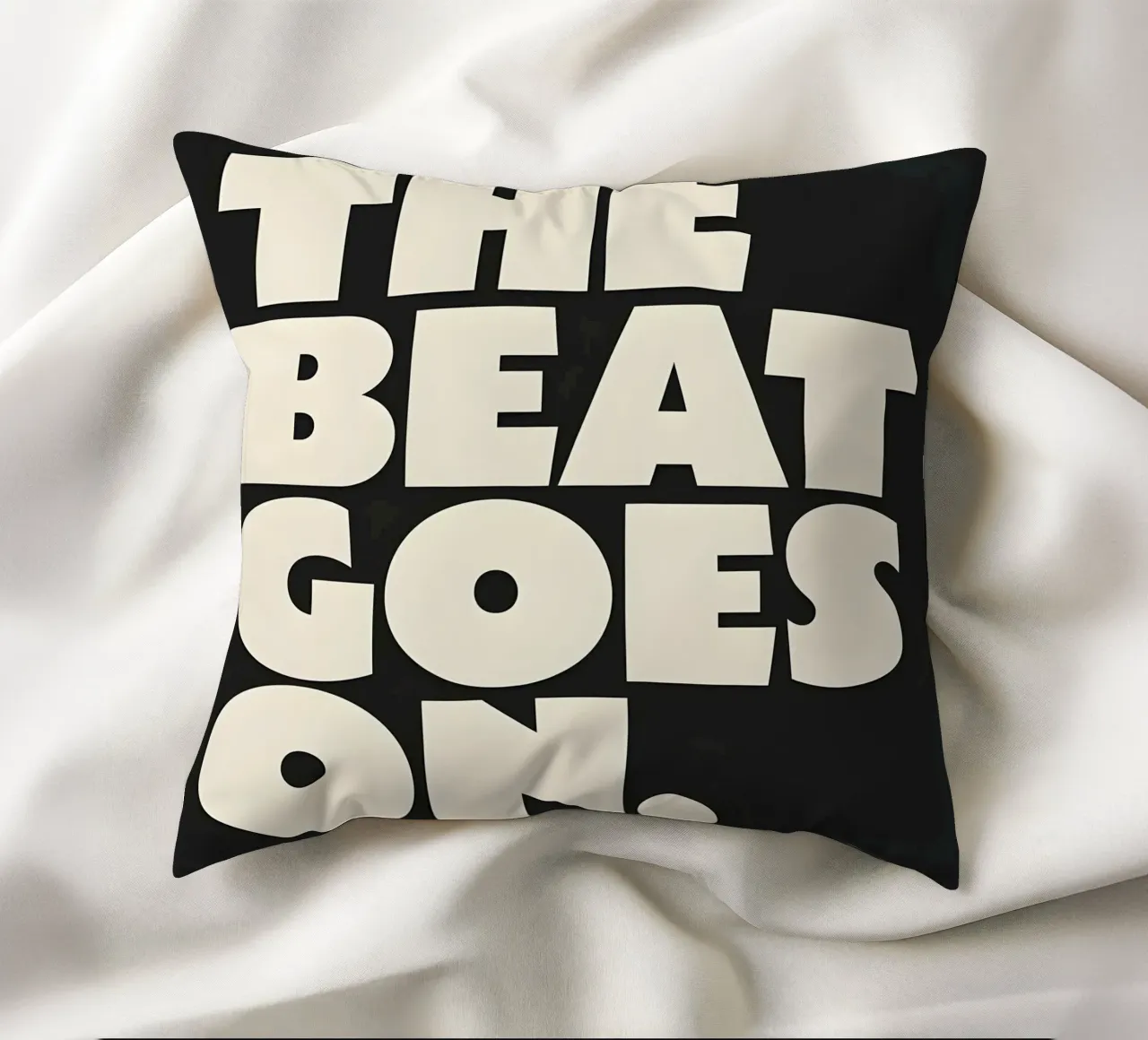 "THE BEAT GOES ON." cuscino da Type & Tape