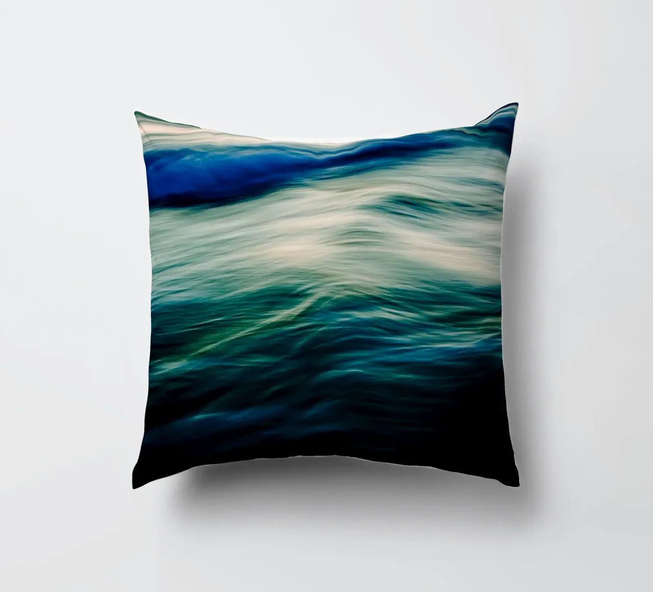 The Uniqueness of Waves V decorative cushion by Tal Paz-Fridman