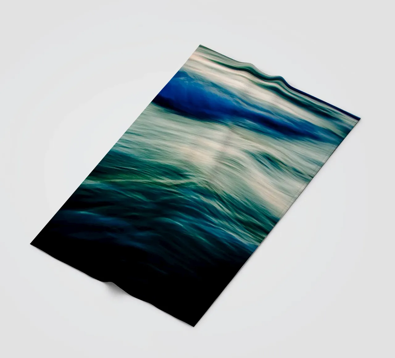 The Uniqueness of Waves V fleece blanket by Tal Paz-Fridman