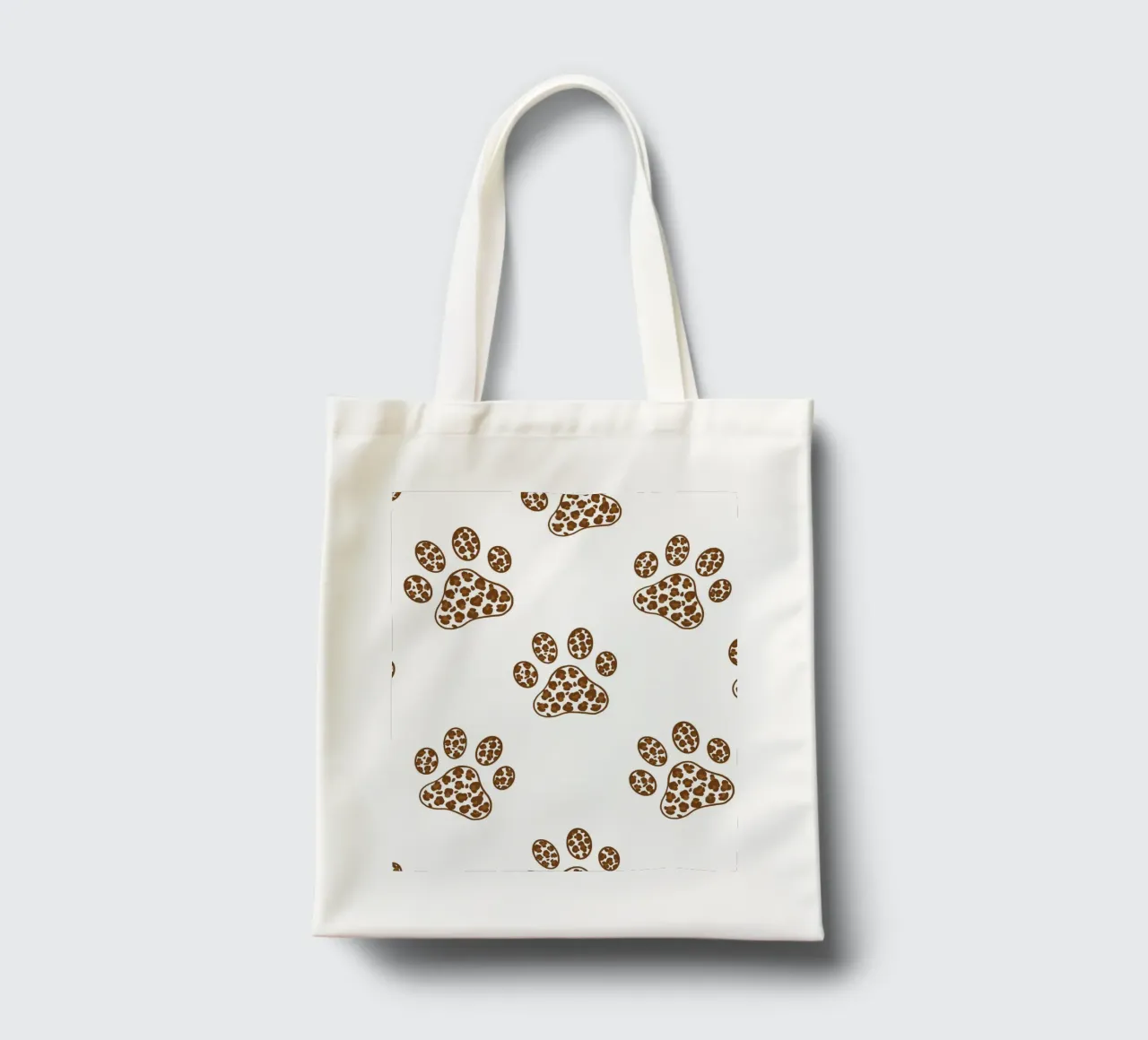 Made of leopard pattern with paw prints tote bag by gulsengunel