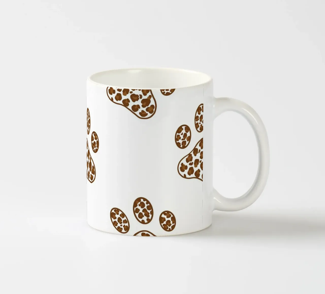 Made of leopard pattern with paw prints ceramic mug by gulsengunel