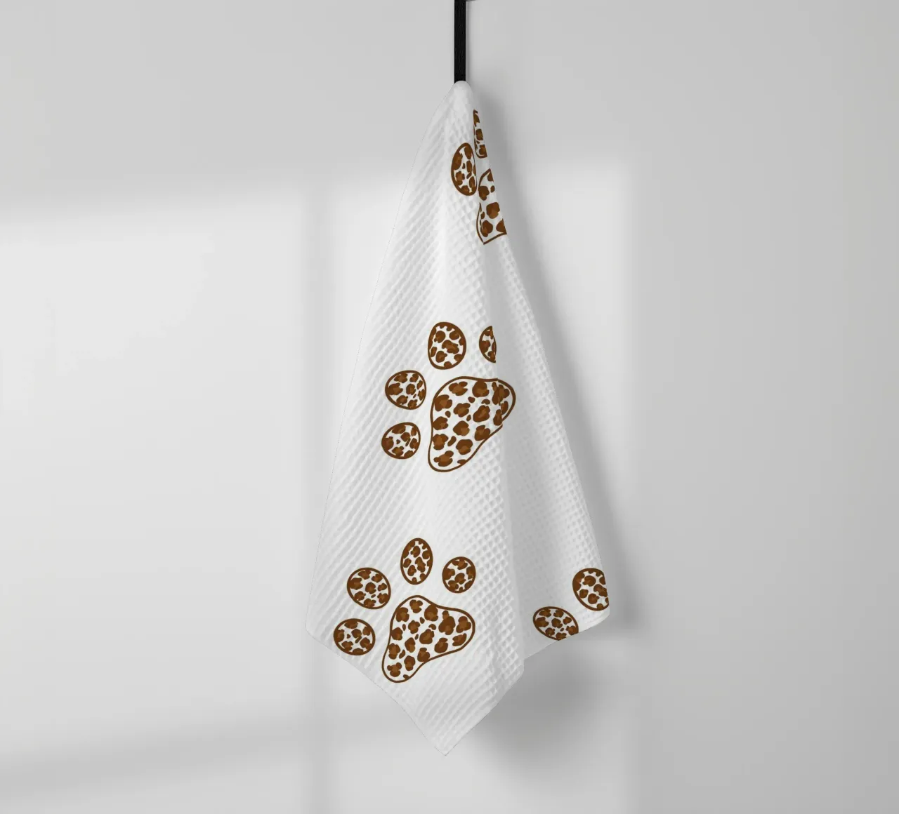 Made of leopard pattern with paw prints tea towel by gulsengunel