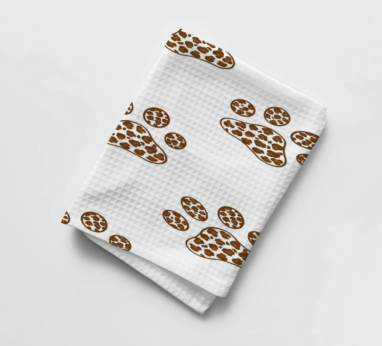 Made of leopard pattern with paw prints tea towel by gulsengunel