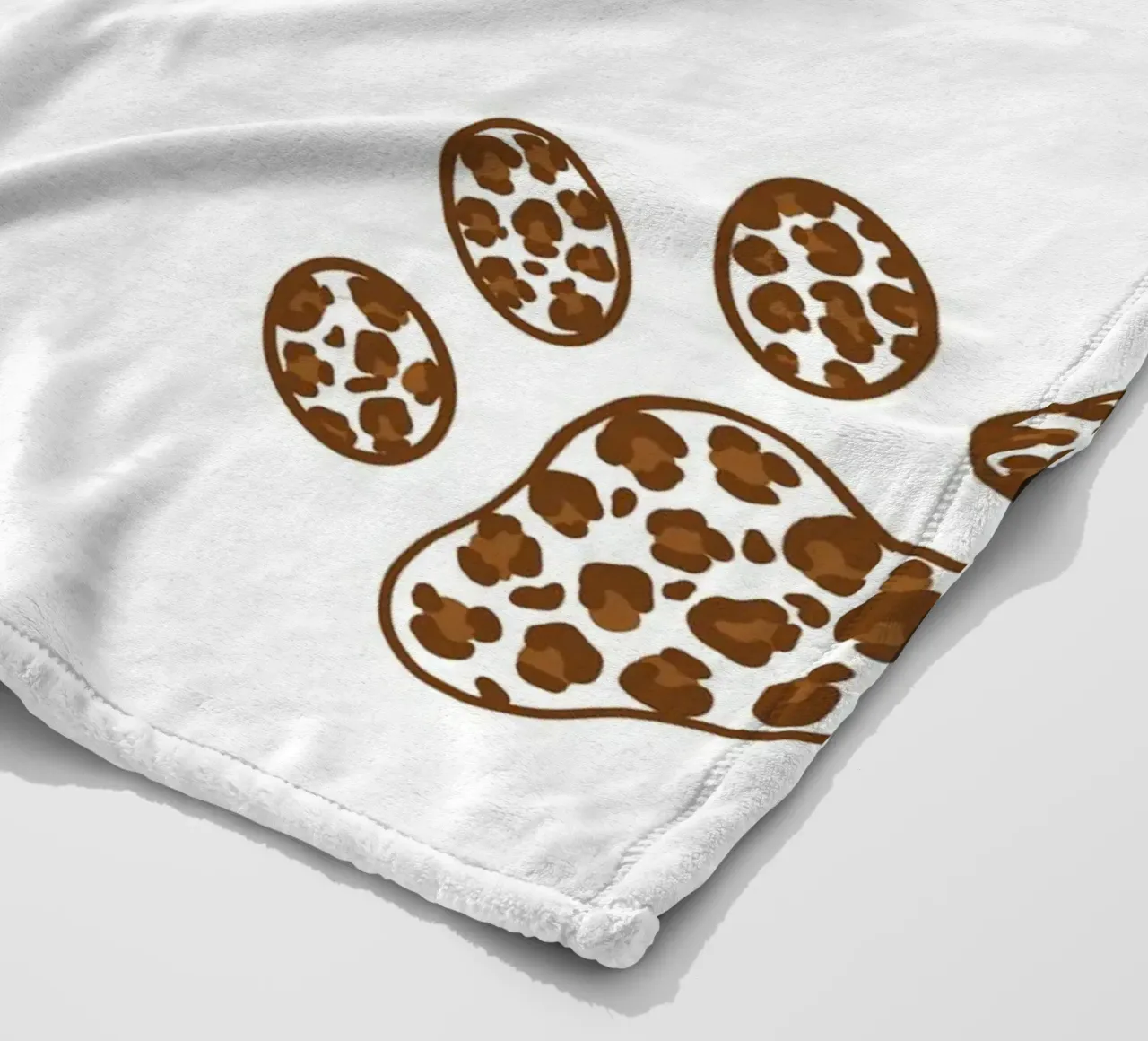 Made of leopard pattern with paw prints fleece blanket by gulsengunel