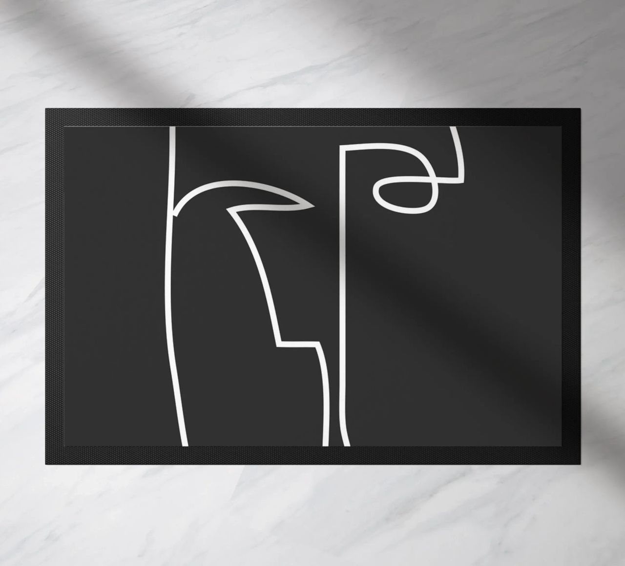 visage abstrait en dessin au trait paillasson de ThingDesign