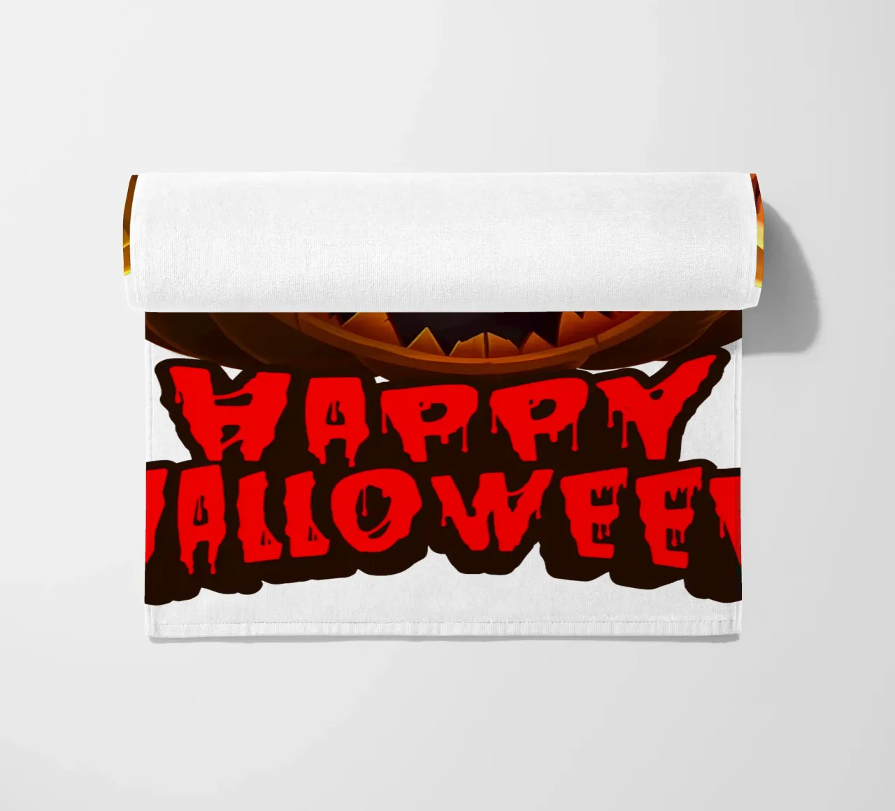 buon halloween zucca faccia di fantasma telo mare da muhidines