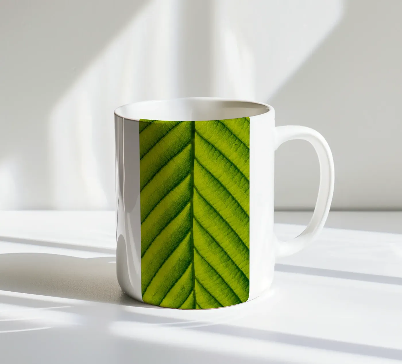 Green leaf ceramic mug by anderm