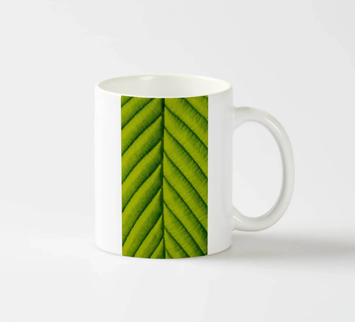 Green leaf ceramic mug by anderm