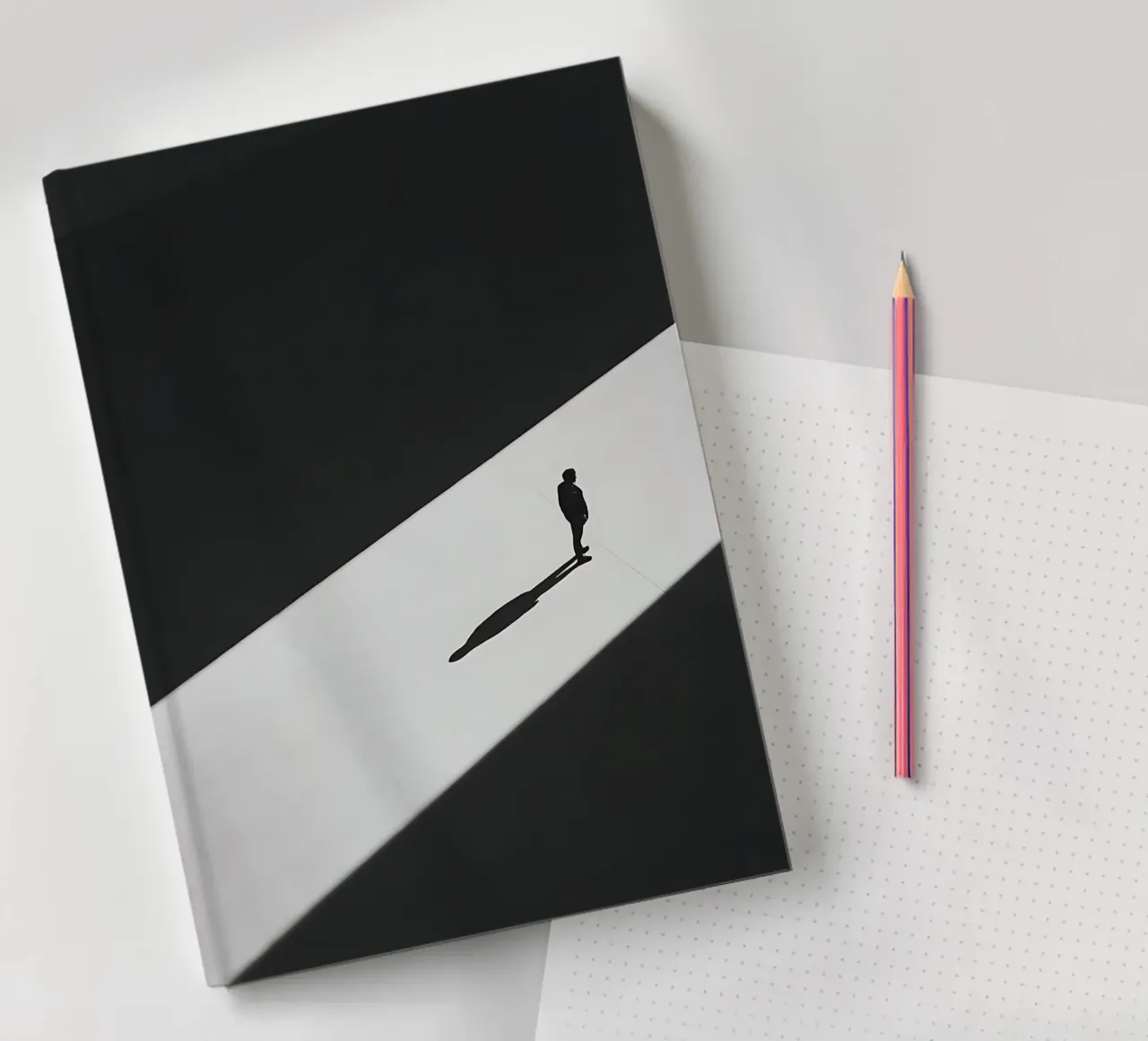 Shadow in the light notebook by Plain Thoughts