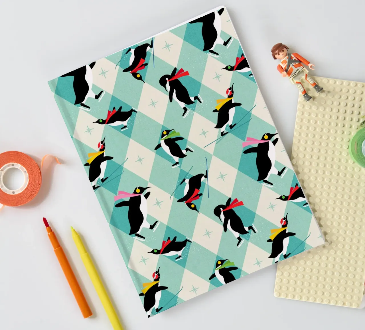 Festive Penguins ice-skating • Retro aqua argyle Pattern notebook by Dominique Vari