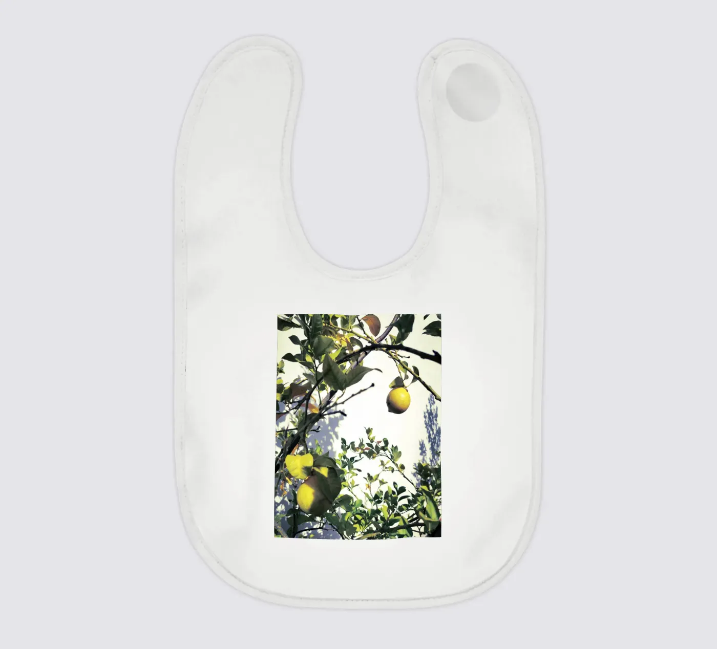 Lemons baby bib by Angelo Cerantola