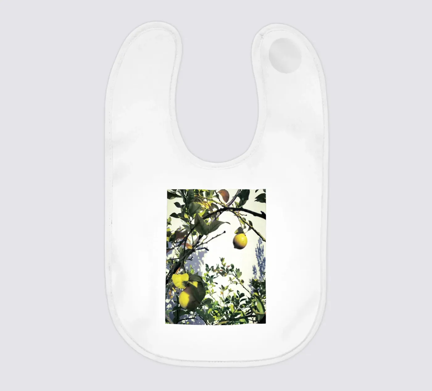 Lemons baby bib by Angelo Cerantola