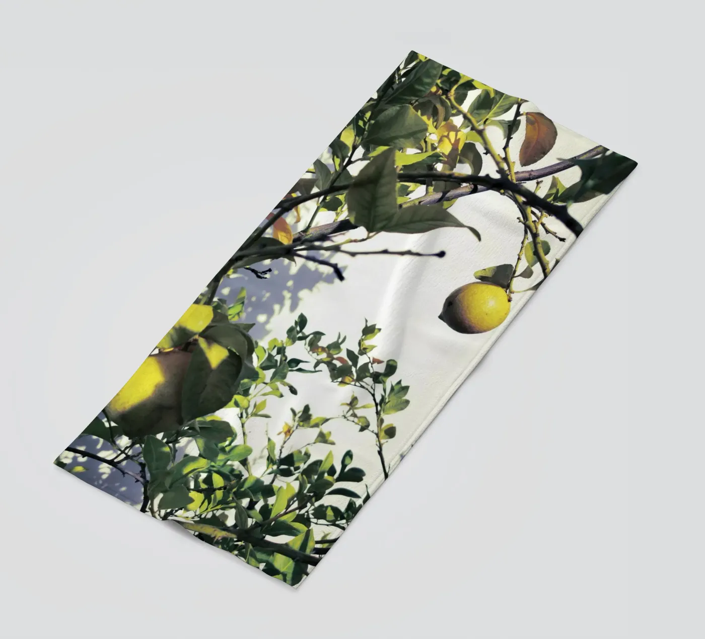 Lemons beach towel by Angelo Cerantola