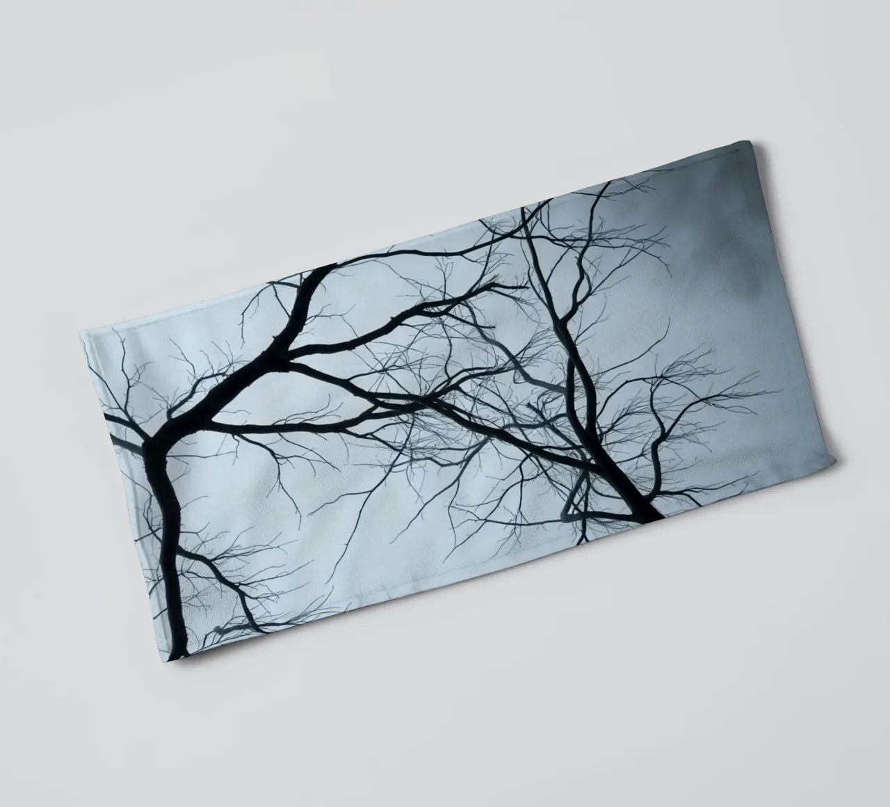 Bare Tree Branches Against Overcast Sky towel by DesignDoodle