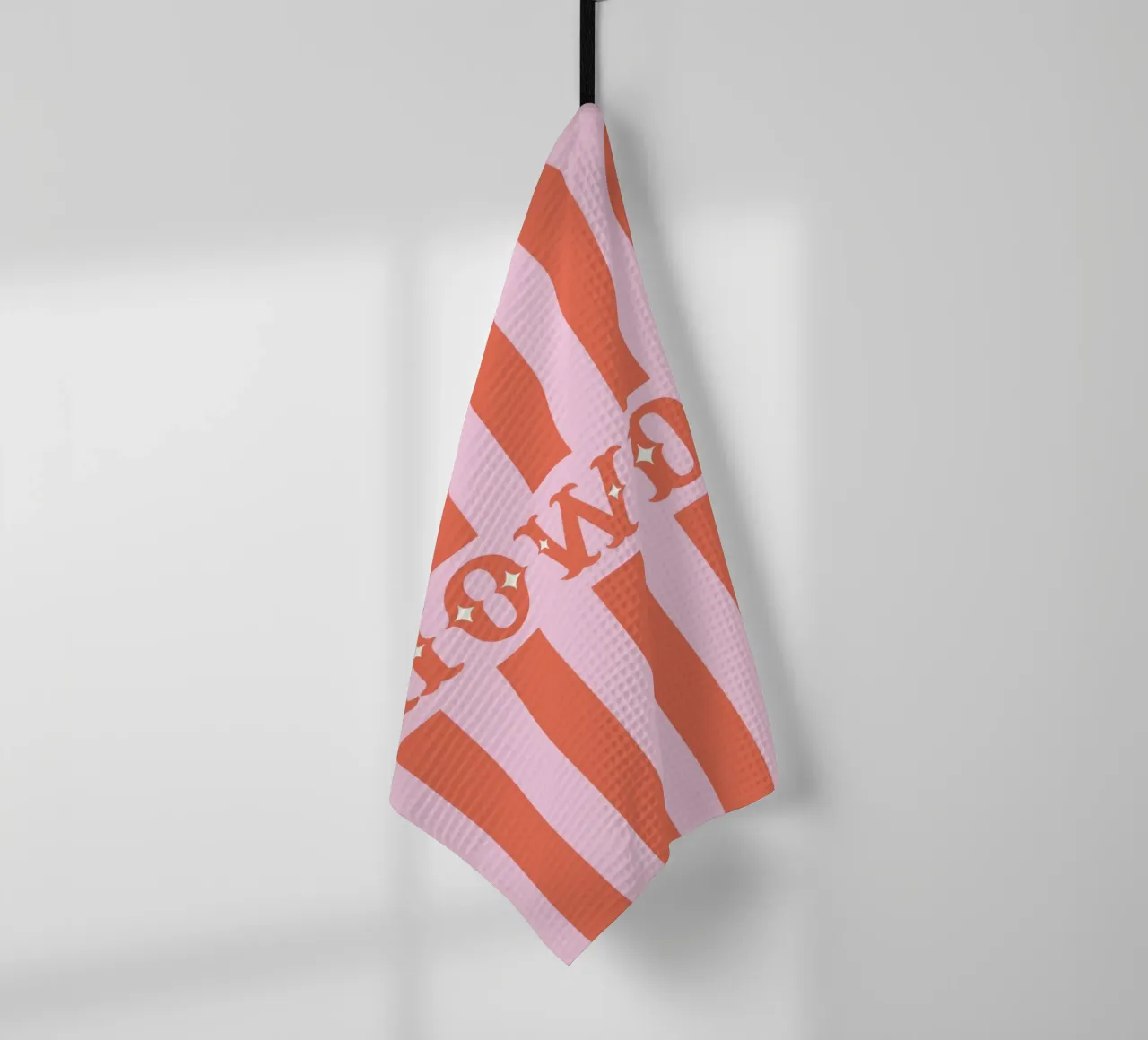 Howdy – Western Typography Print in Coral and Pink tea towel by Vivdesign