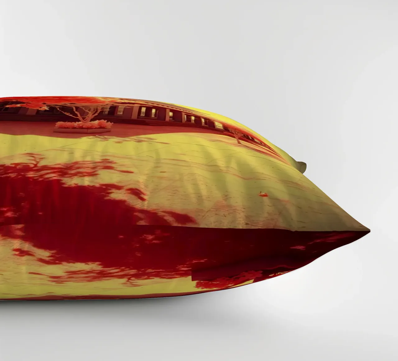 Building Facade with Trees in Red and Yellow Light decorative cushion by DesignDoodle