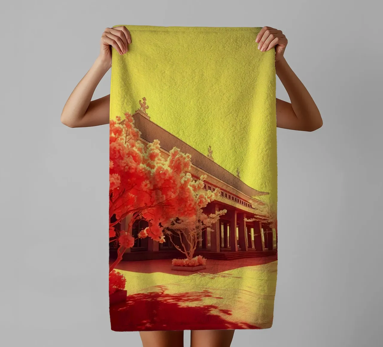 Building Facade with Trees in Red and Yellow Light towel by DesignDoodle