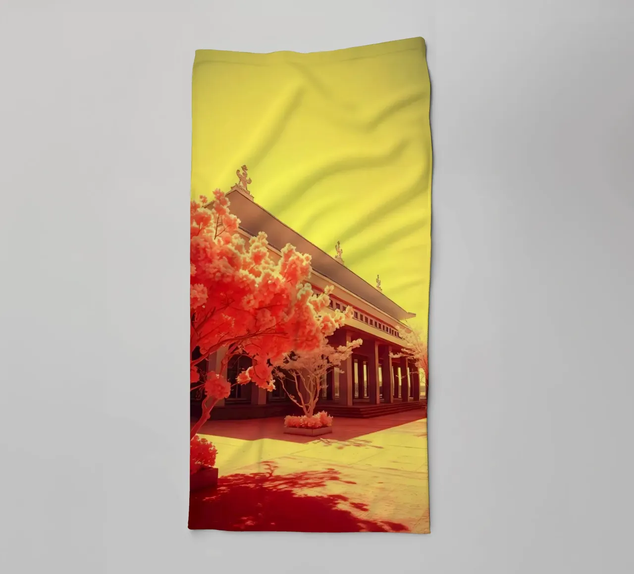 Building Facade with Trees in Red and Yellow Light towel by DesignDoodle