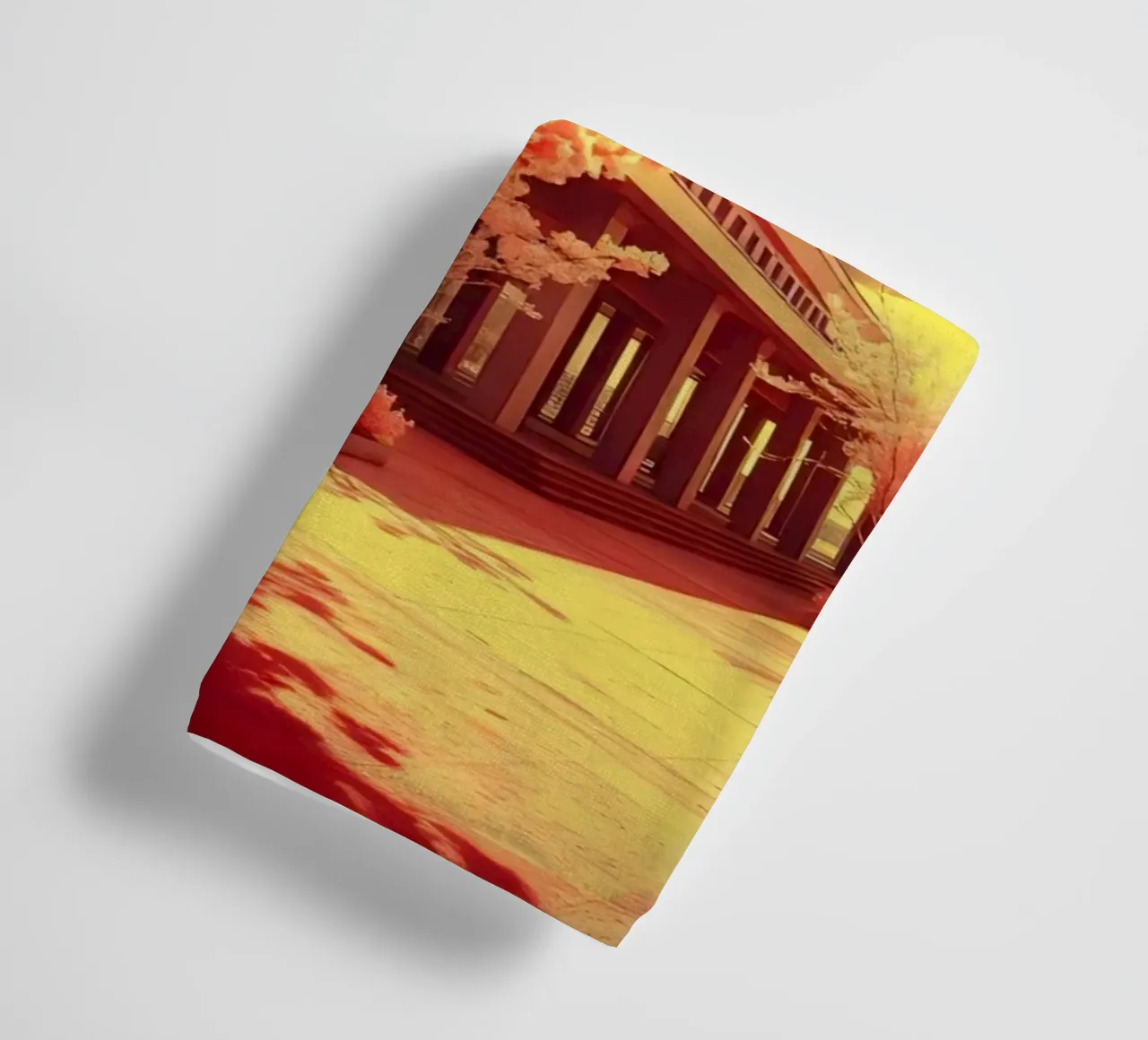 Building Facade with Trees in Red and Yellow Light towel by DesignDoodle