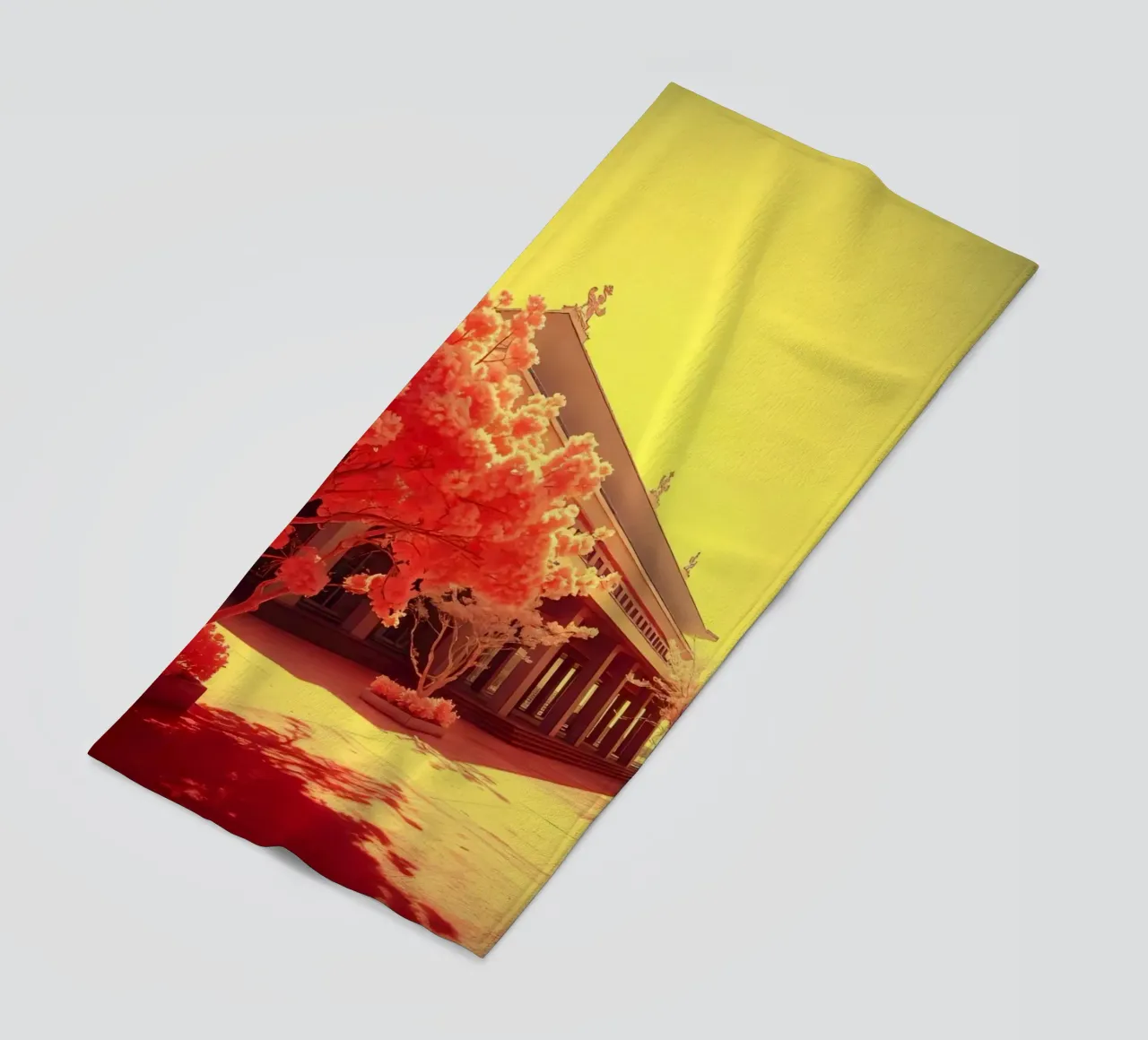Building Facade with Trees in Red and Yellow Light beach towel by DesignDoodle
