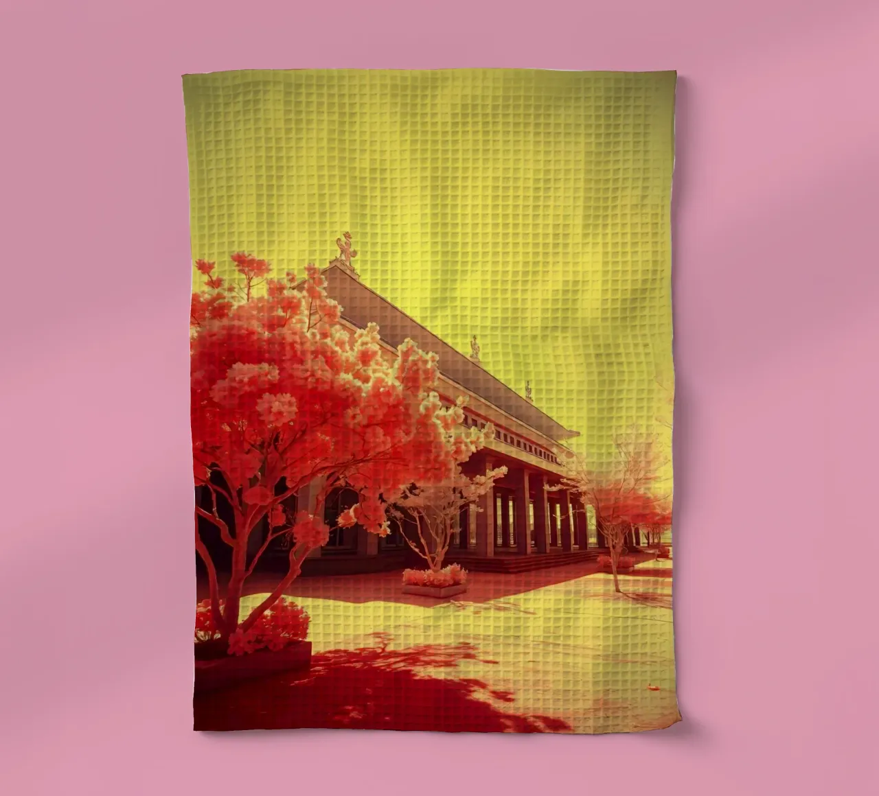 Building Facade with Trees in Red and Yellow Light tea towel by DesignDoodle