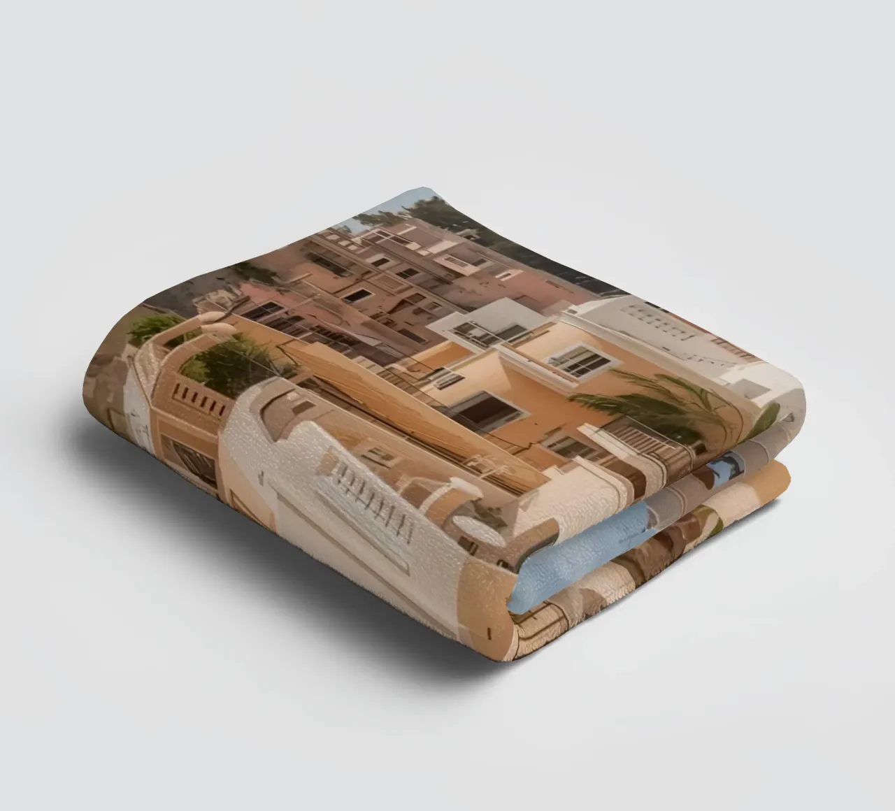 Bâtiments à flanc de falaise avec architecture donnant sur l'océan serviette de bain de DesignDoodle