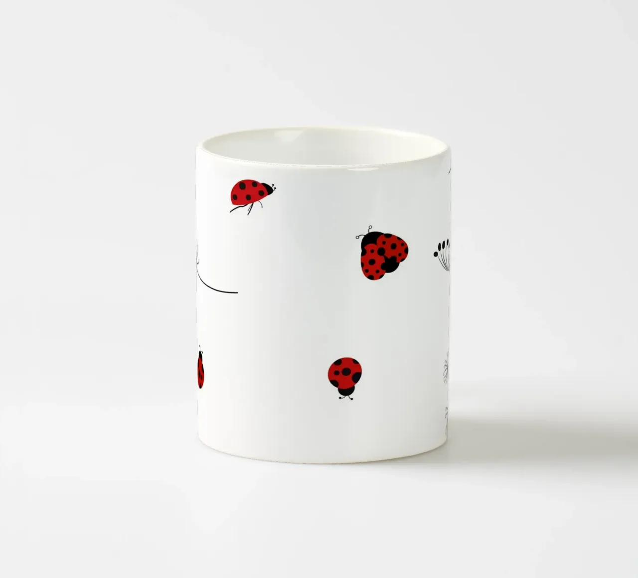 Lady bug and dandelion pattern ceramic mug by gulsengunel