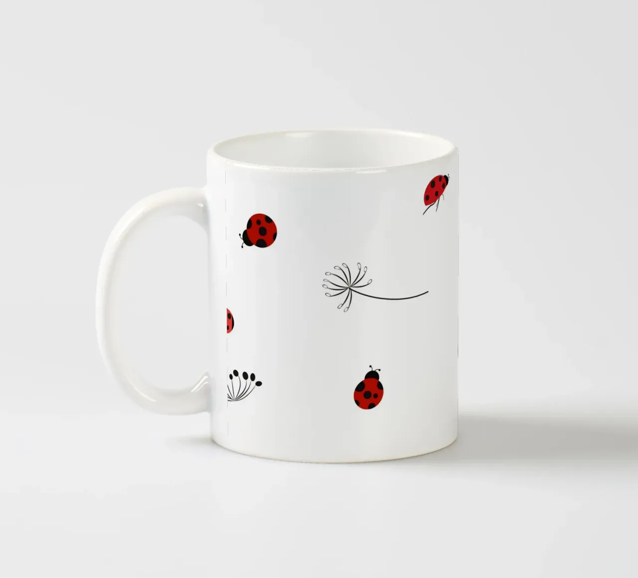 Lady bug and dandelion pattern ceramic mug by gulsengunel