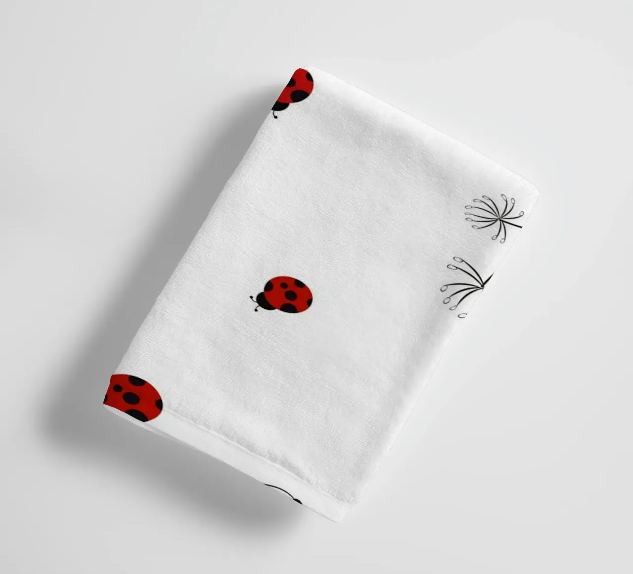 Lady bug and dandelion pattern towel by gulsengunel