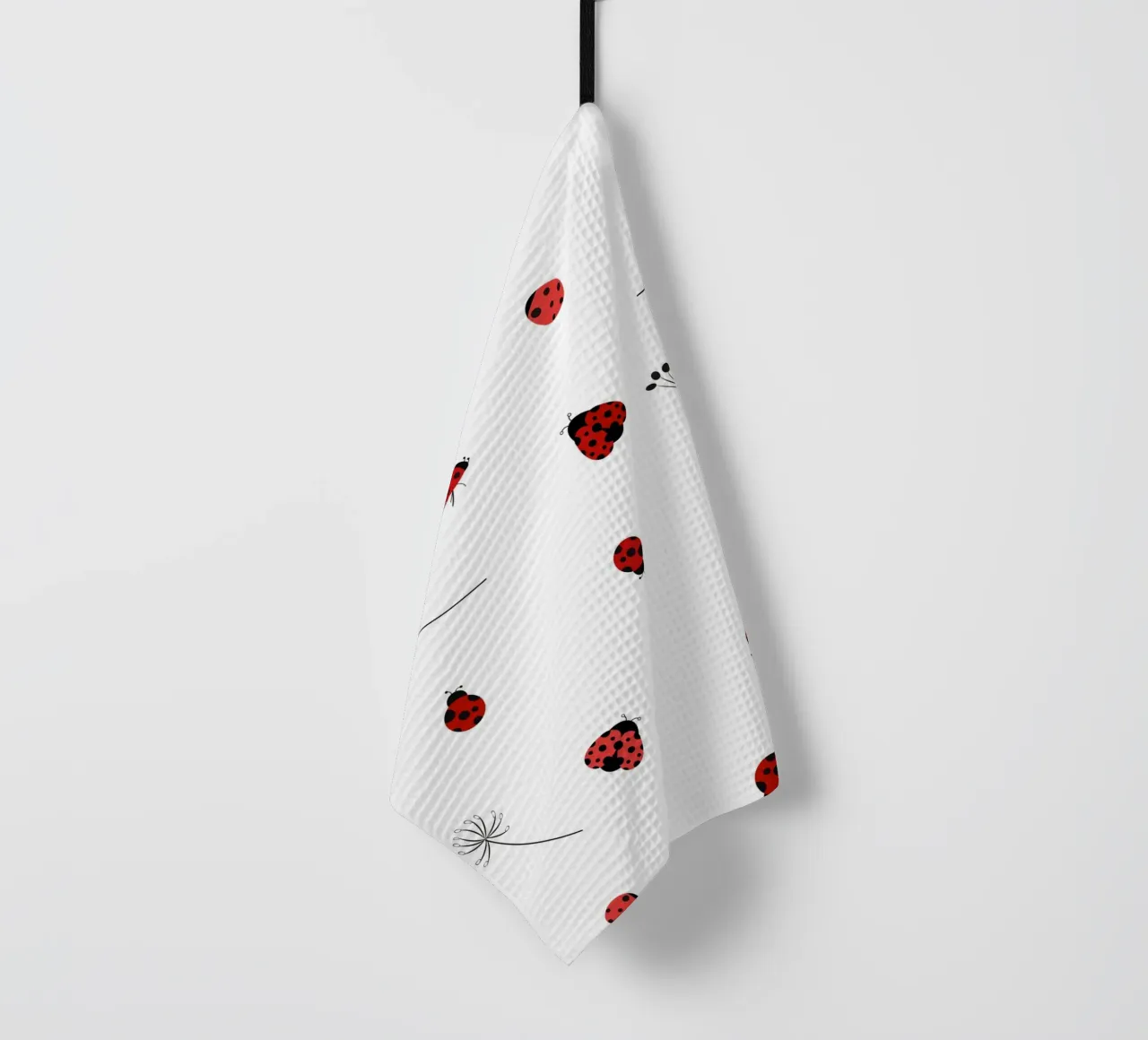 Lady bug and dandelion pattern tea towel by gulsengunel