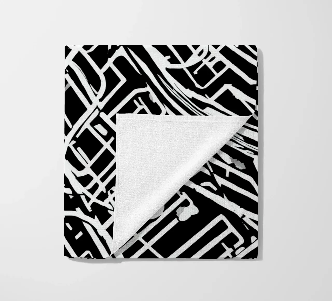 Modello astratto di linee intersecanti in bianco e nero telo mare da DesignDoodle