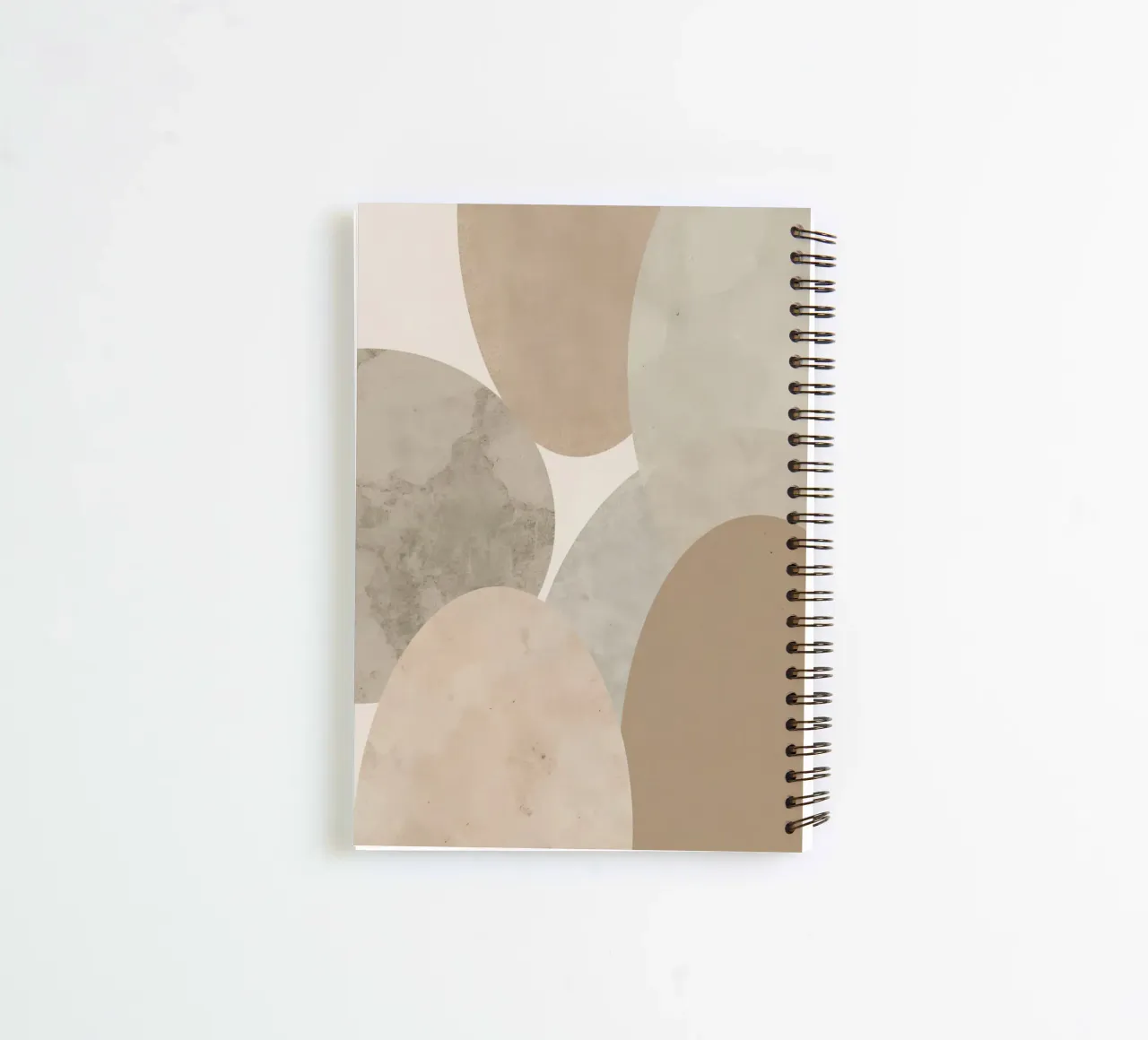 Abstract Image of Overlapping Beige and Gray Ovals spiral notebook by DesignDoodle
