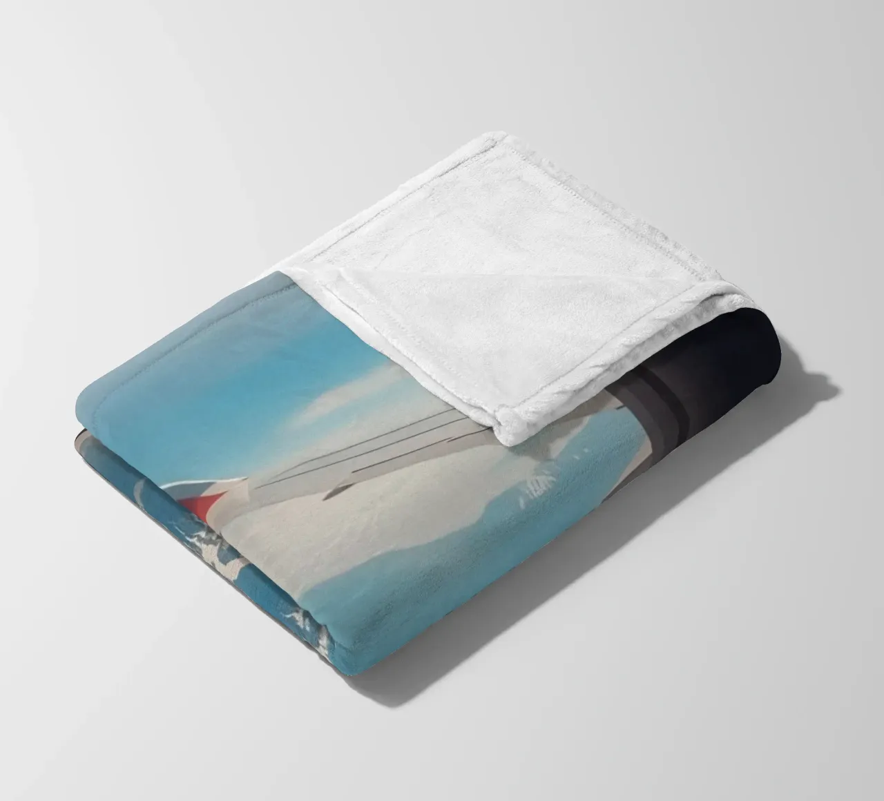 Vue d'un hublot d'avion sur une aile et des montagnes plaid polaire de DesignDoodle