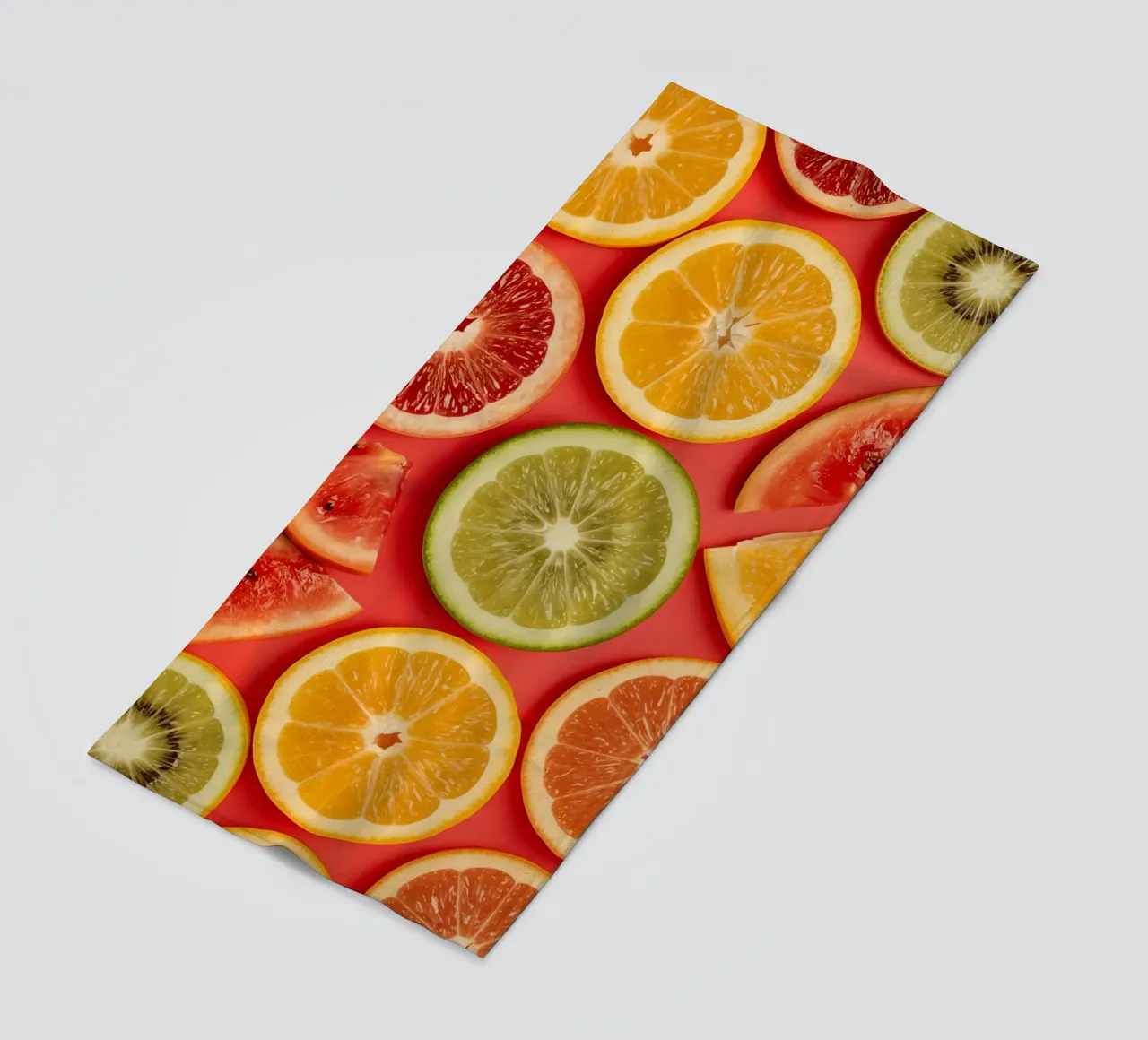 Assorted Sliced Citrus Fruits on Red Background beach towel by DesignDoodle