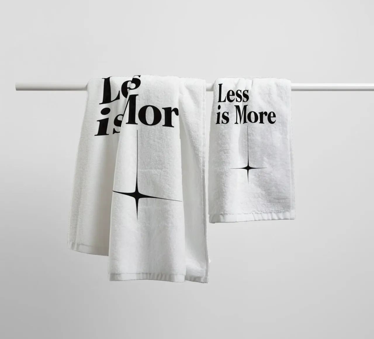 Black Text Less is More Above Four Point Star towel by DesignDoodle