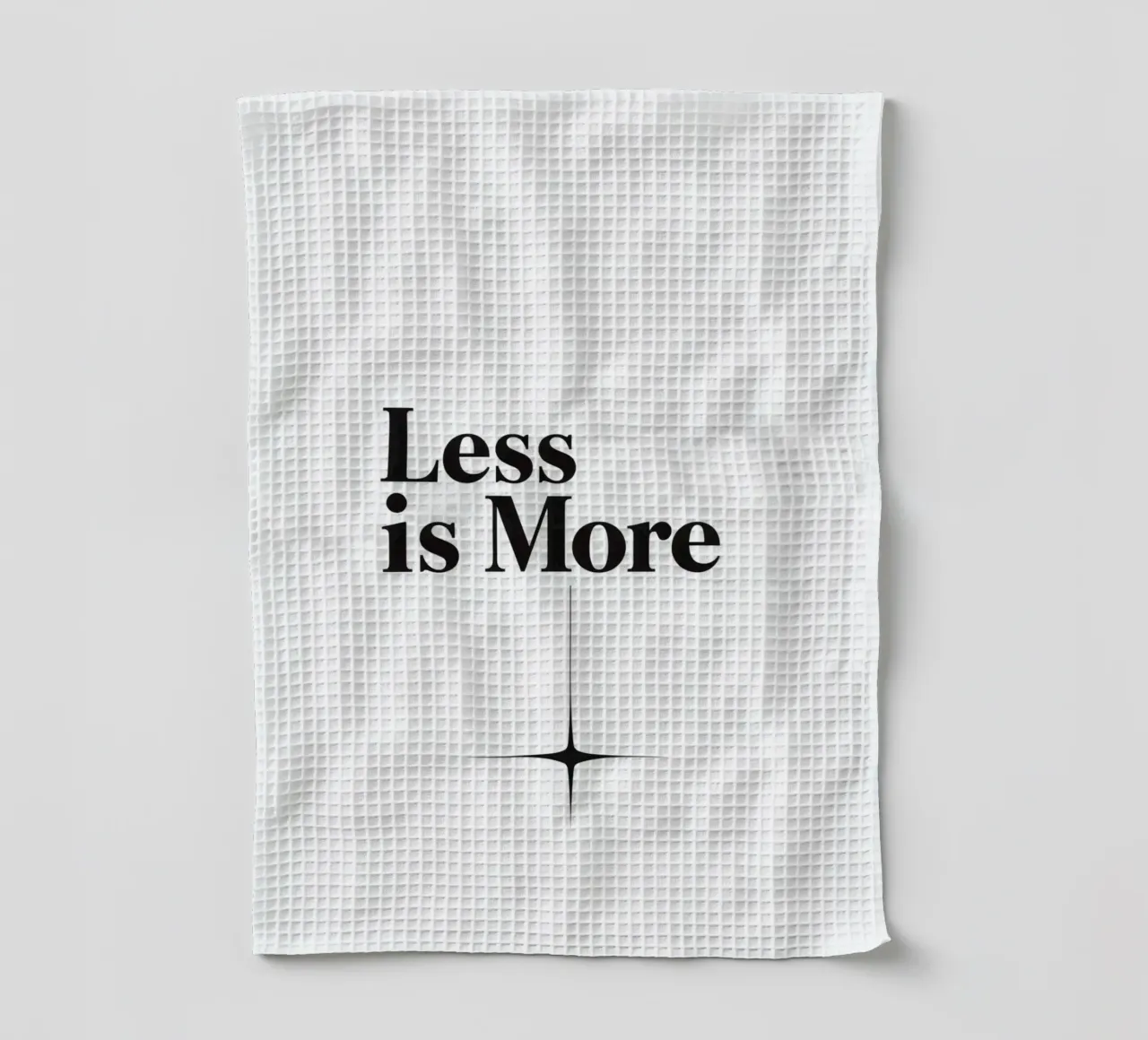 Texte noir Moins c'est plus Au-dessus de l'étoile à quatre branches torchon de DesignDoodle