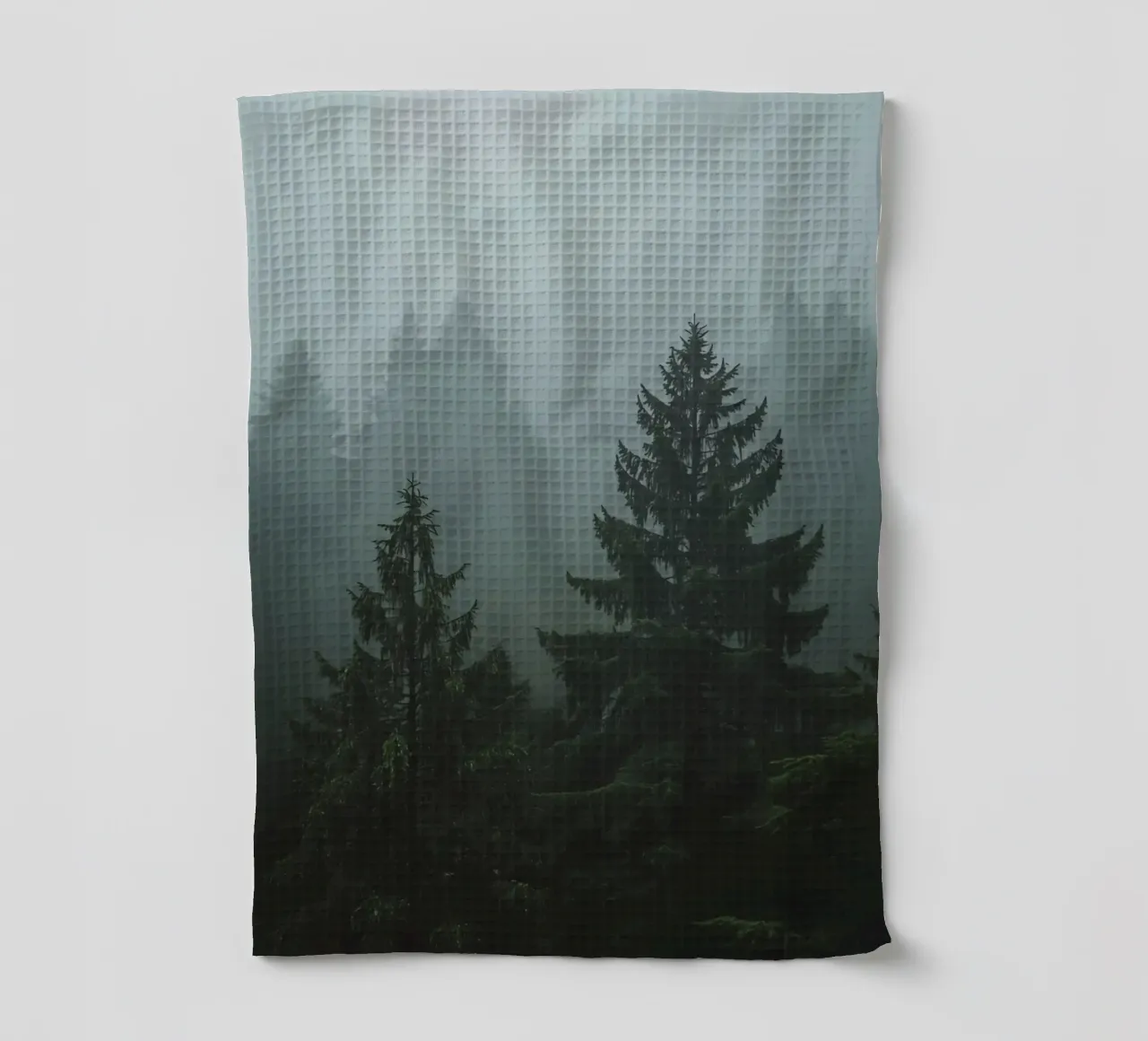 Evergreen Trees in Fog theedoek van DesignDoodle
