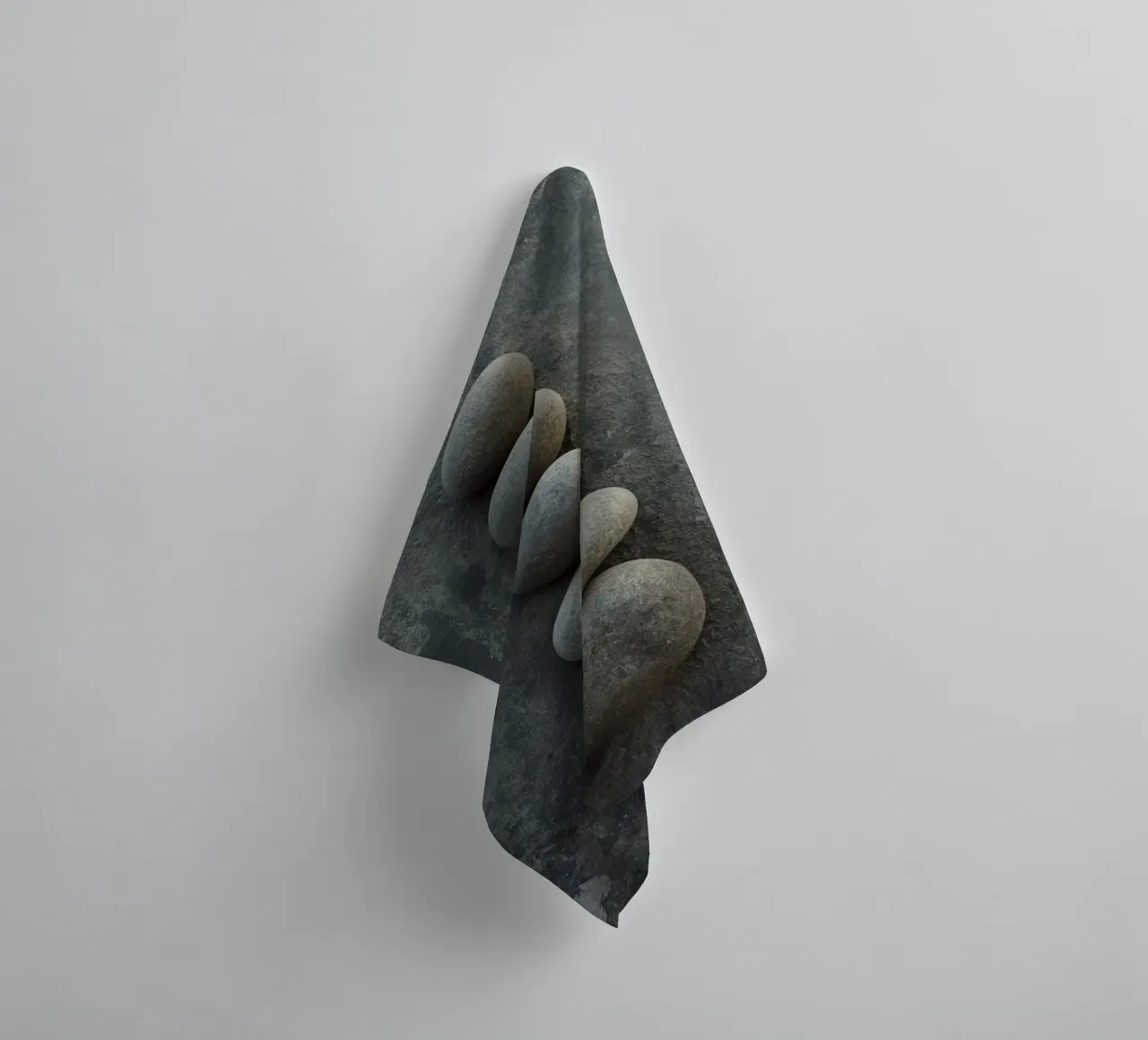 Five Gray Stones Stacked Vertically on Textured Surface towel by DesignDoodle