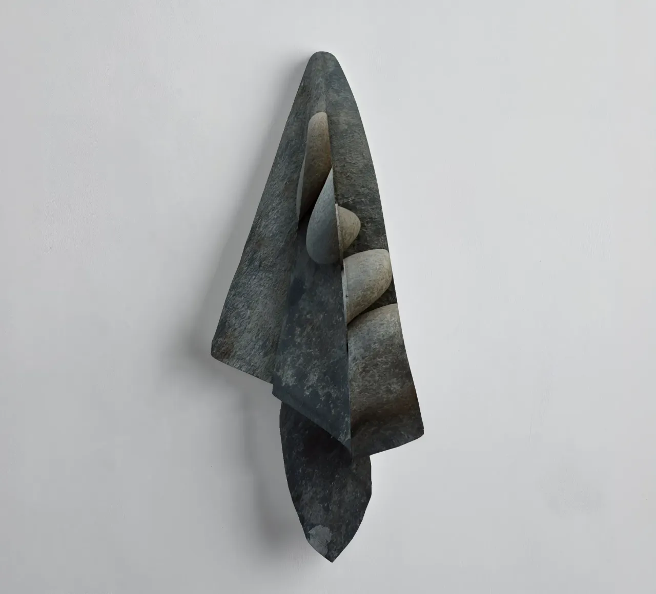 Five Gray Stones Stacked Vertically on Textured Surface towel by DesignDoodle