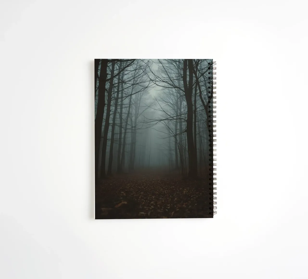 Foggy Forest Path with Bare Trees and Fallen Leaves spiral notebook by DesignDoodle