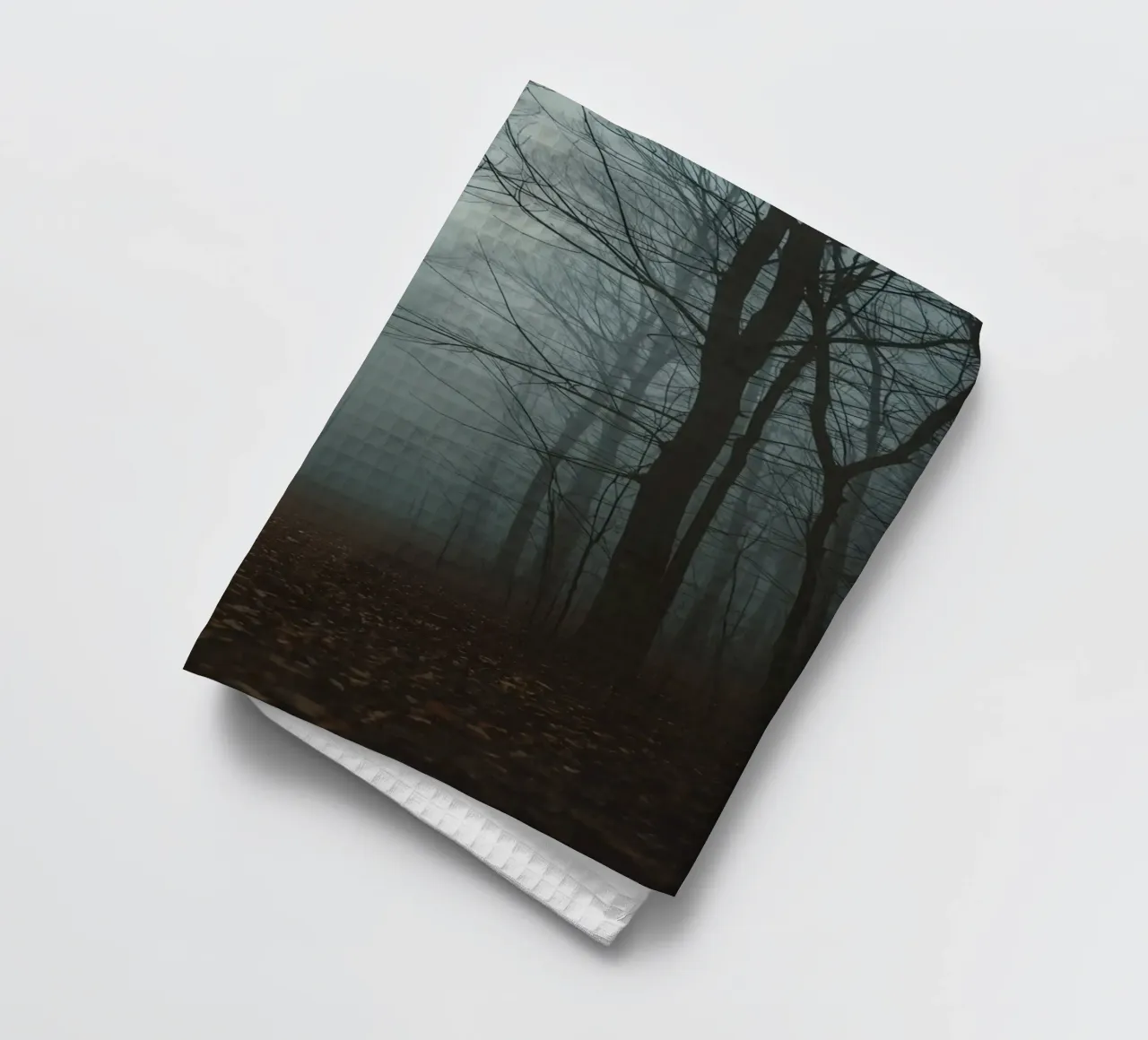Foggy Forest Path with Bare Trees and Fallen Leaves tea towel by DesignDoodle