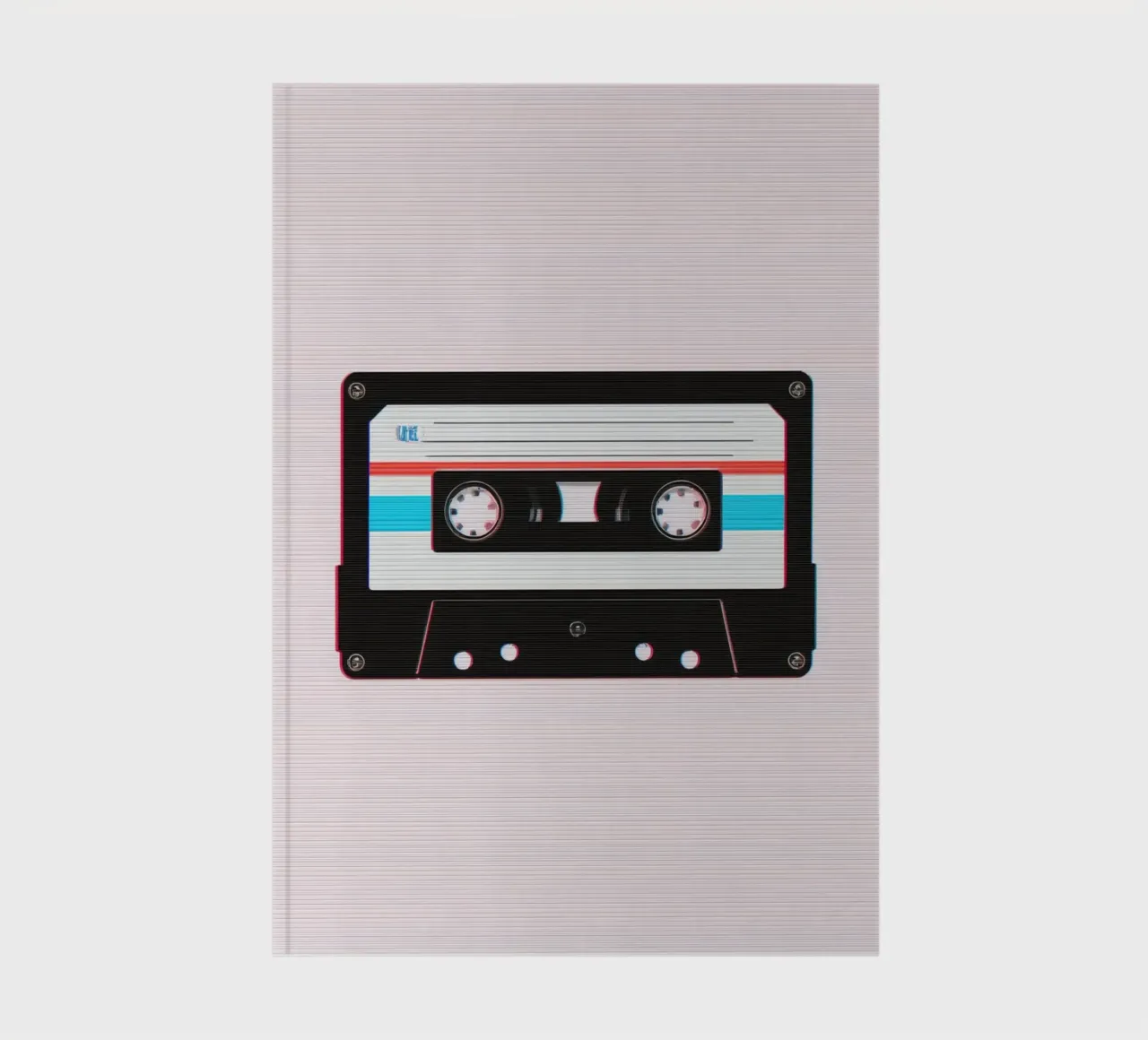Cassette Tape with Glitch Effect on Striped Background notebook by DesignDoodle