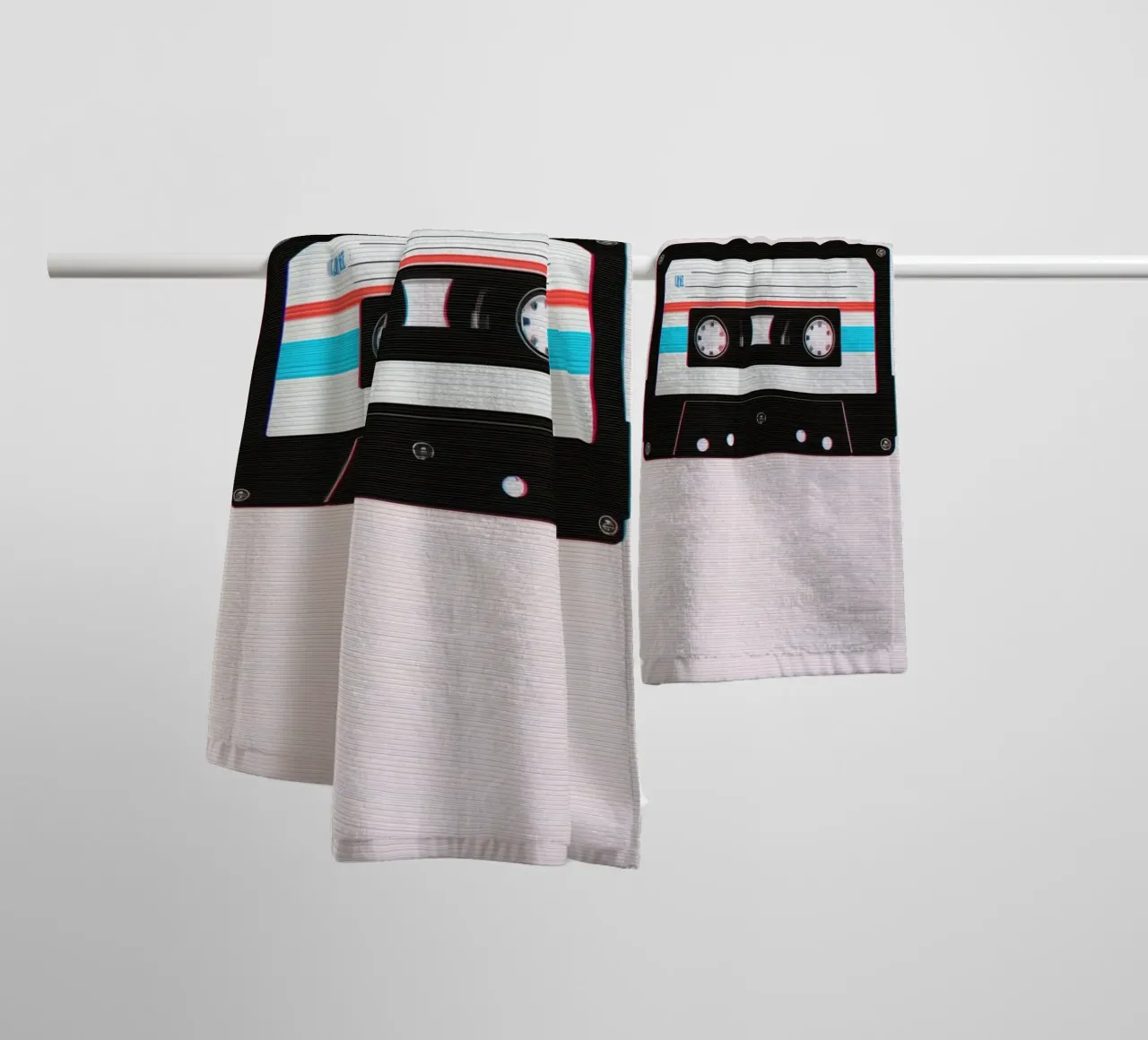 Cassette Tape with Glitch Effect on Striped Background towel by DesignDoodle