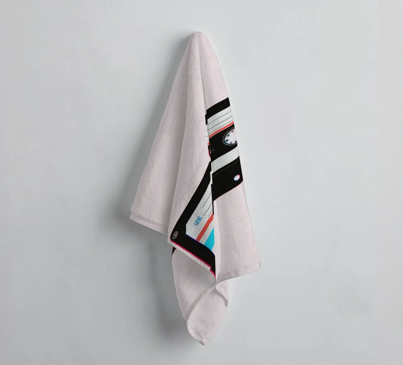 Cassette Tape with Glitch Effect on Striped Background towel by DesignDoodle