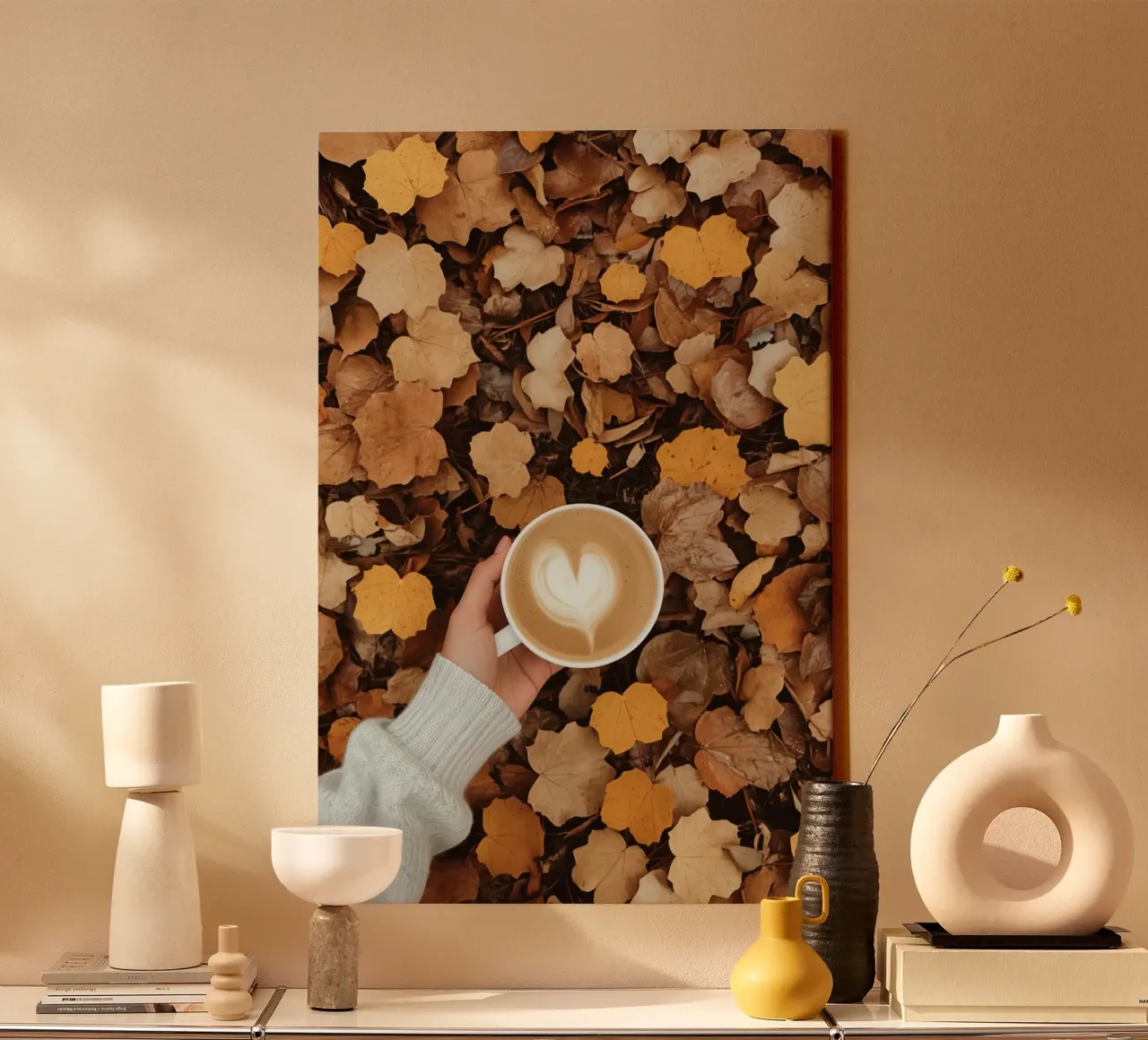 Latte with Heart Art on Autumn Leaves Held by Hand canvas with Floater frame by DesignDoodle