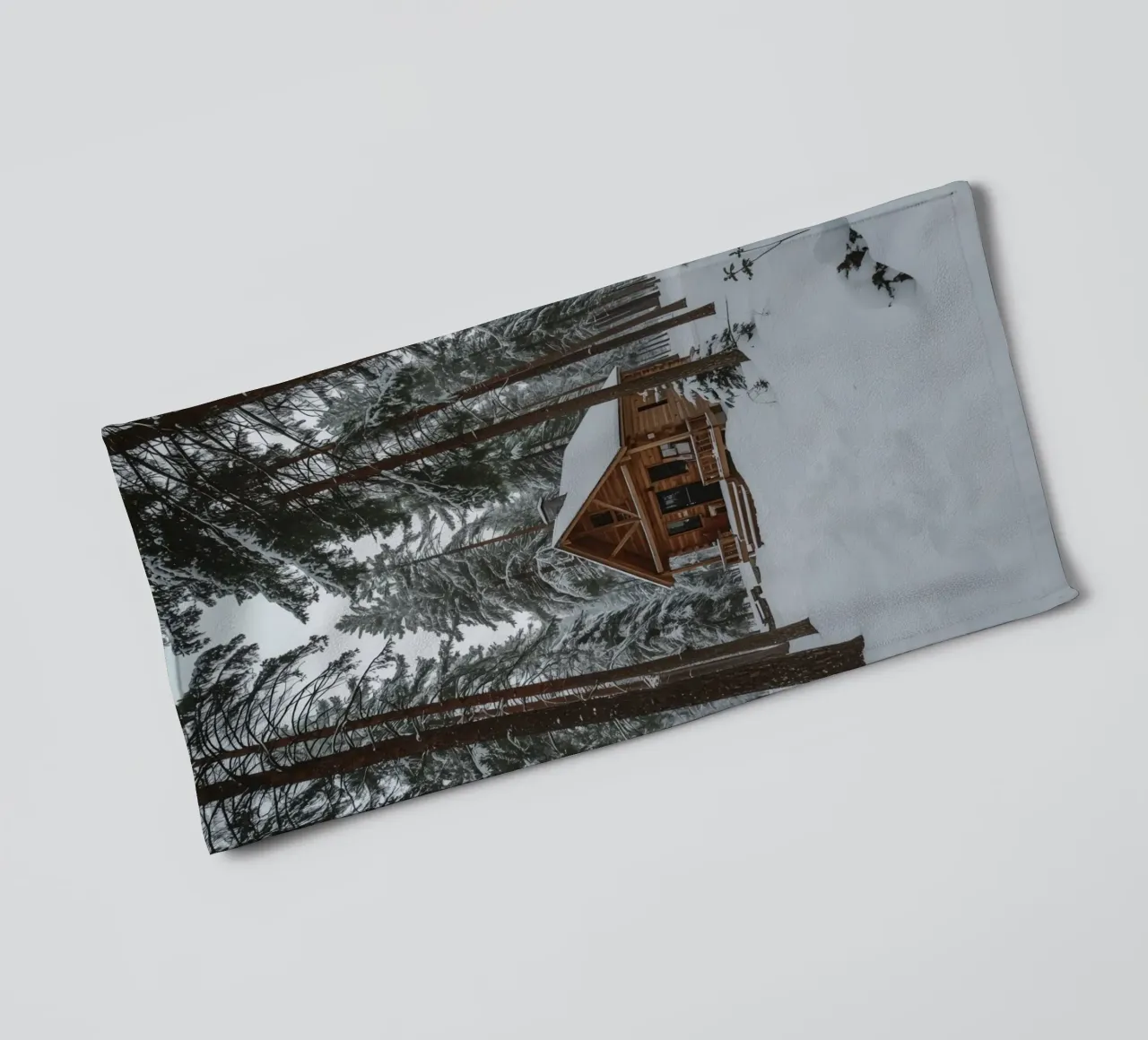 Log Cabin in Snow-Covered Forest towel by DesignDoodle