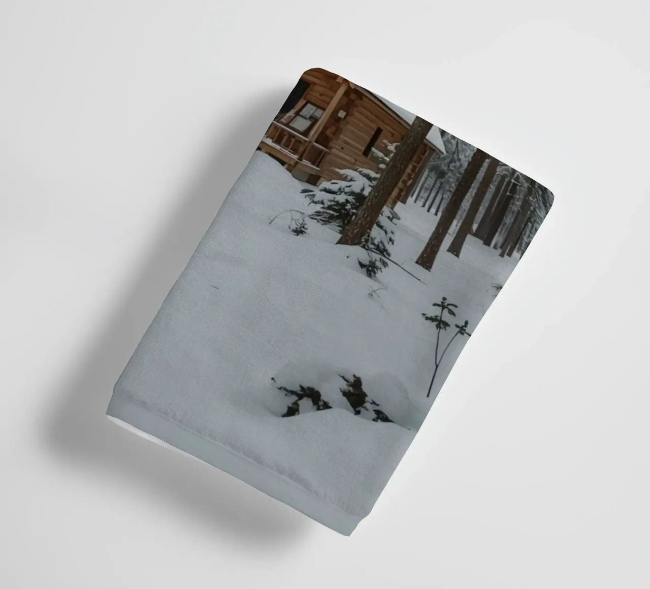 Log Cabin in Snow-Covered Forest towel by DesignDoodle