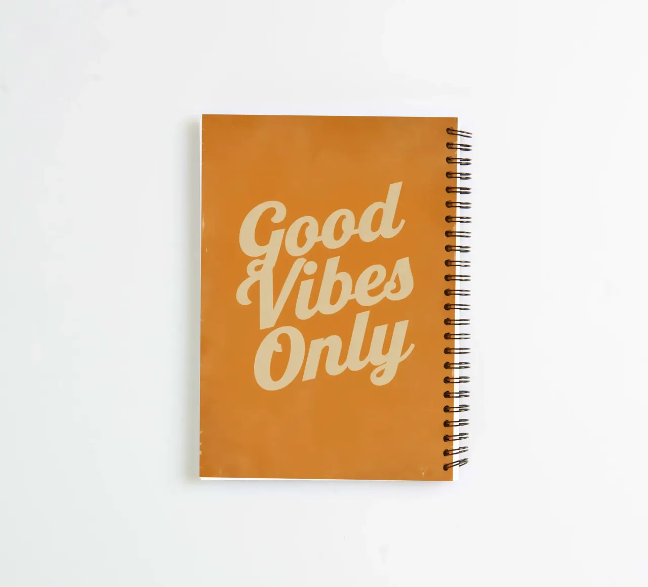 Orange Background with Cream Good Vibes Only spiral notebook by DesignDoodle
